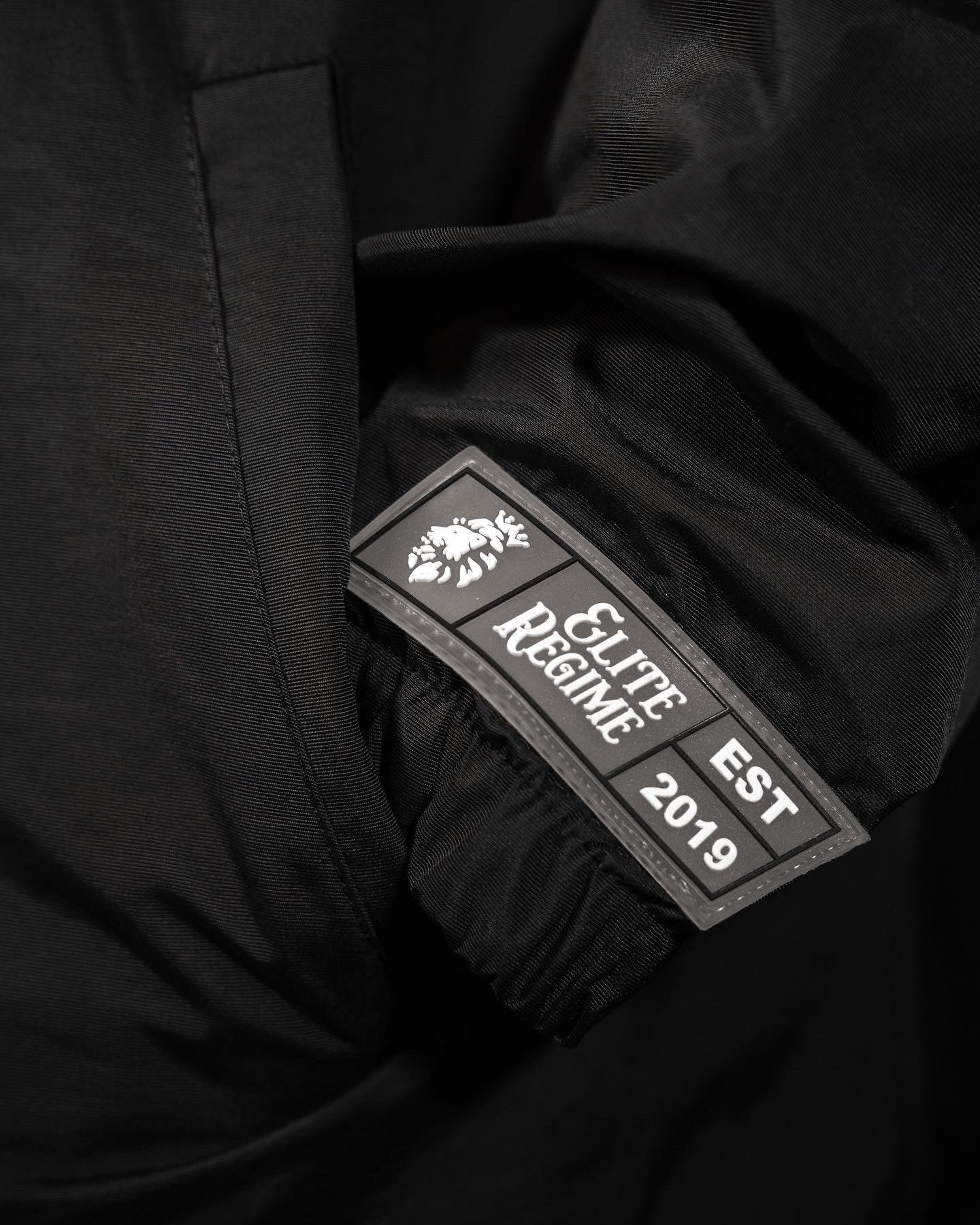 ‘Elite Regime Utility Windbreaker’